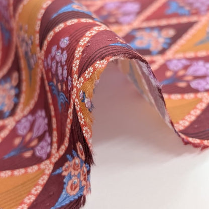 リバティ・ファブリックス　タナローン　Floral Harlequin　フローラル・ハーレクイン　オレンジ＆ワインレッド　約108×50cm
