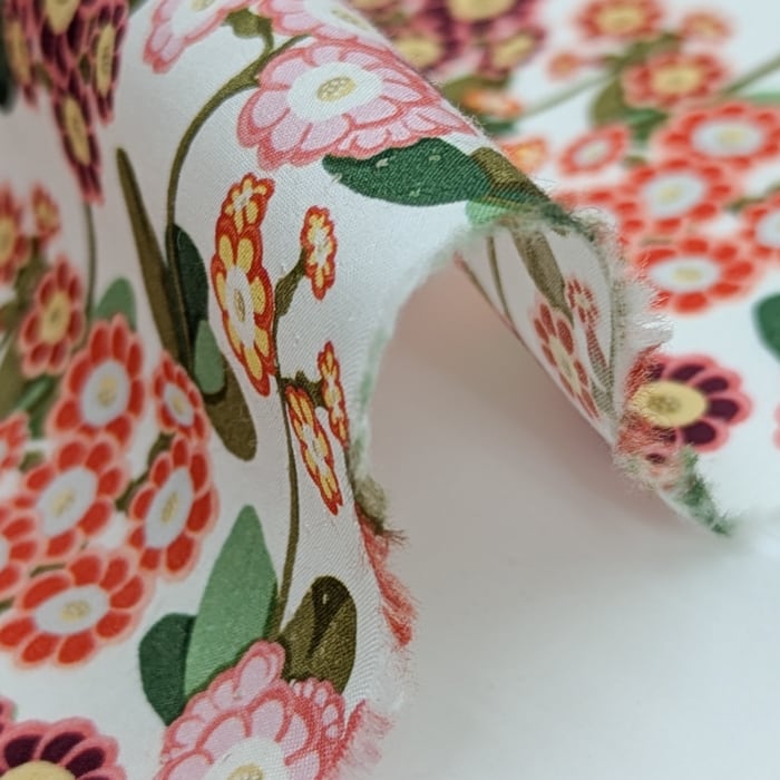 リバティ・ファブリックス　タナローン　Primula Park　プリムラ・パーク　オレンジ/ピンク　約108×50cm
